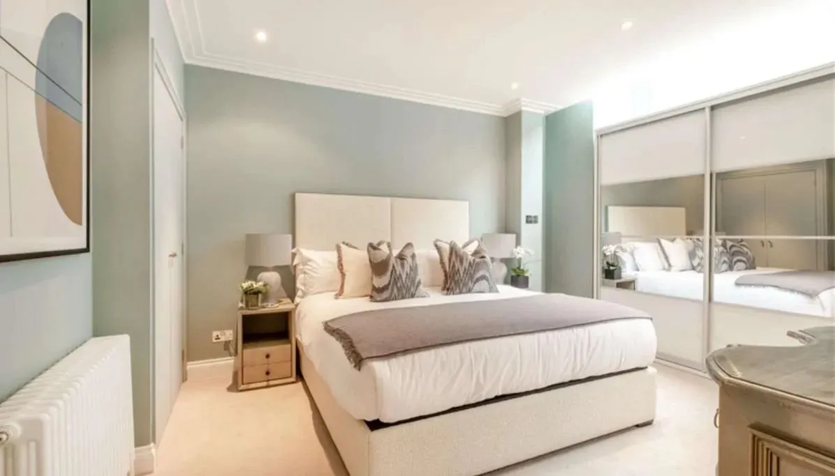 Relaxing and sophisticated bedroom in a luxury short-stay apartment